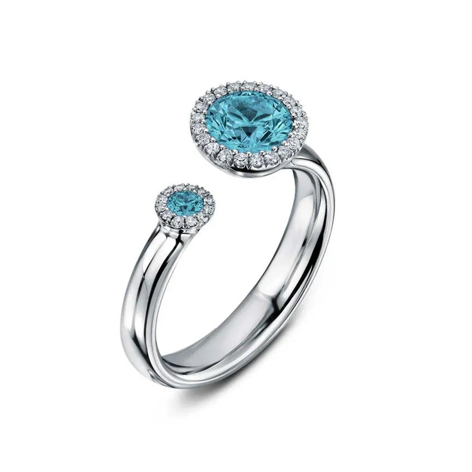 Gemstone Engagement Rings by Andrew Geoghegan with the Satellite featured here with Aquamarine centres with diamond halos in platinum. A design triumph for you to express and gift your love.