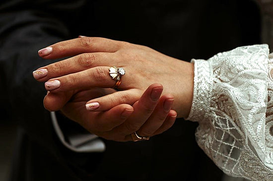 Bespoke British wedding rings by Andrew Geoghegan for Lara and Phil, showcasing fine craftsmanship