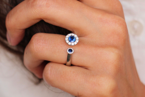 Sapphire Satellite British engagement ring by Andrew Geoghegan with a vibrant gemstone