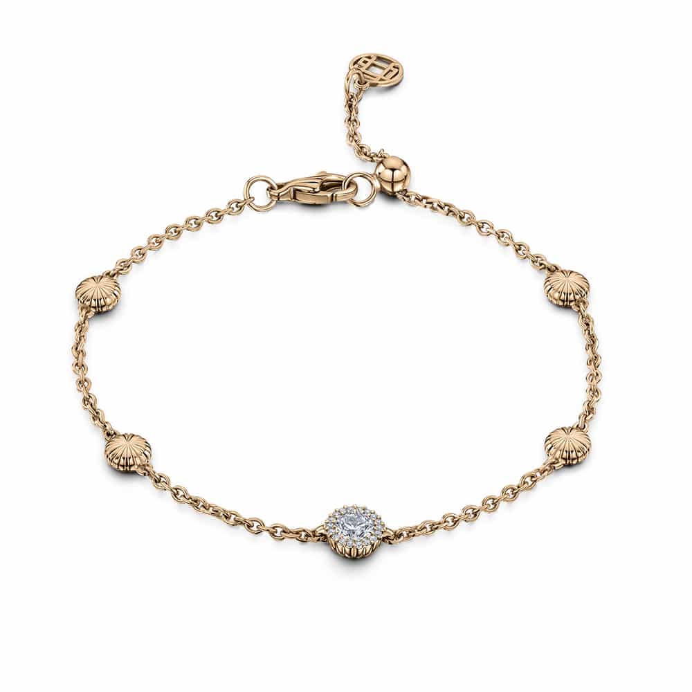 Cannelé bracelet in 18ct rose gold with fluted beads and a central diamond