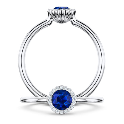 Minuit Rich Blue Sapphire Ring with white Diamond halo in Platinum, front and side views