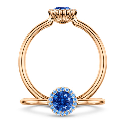 Rivage Medium Blue Sapphire Ring with Blue Sapphire halo in 18ct Rose Gold, front and side views