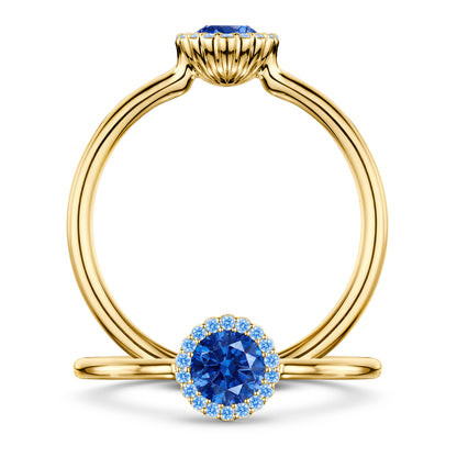Rivage Medium Blue Sapphire Ring with Blue Sapphire halo in 18ct Yellow Gold, front and side views