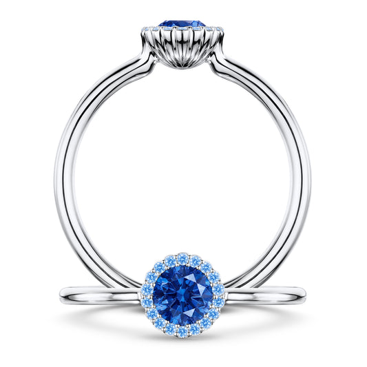 Rivage Medium Blue Sapphire Ring with Blue Sapphire halo in Platinum, front and side views