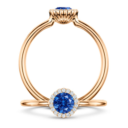Rivage Medium Blue Sapphire Ring with white Diamond halo in 18ct Rose Gold, front and side views