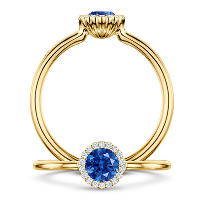 Rivage Medium Blue Sapphire Ring with white Diamond halo in 18ct Yellow Gold, front and side views