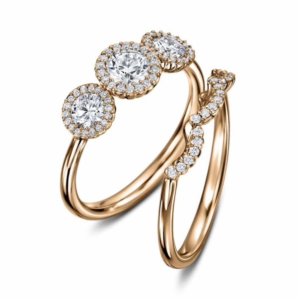 Cannelé Trois three stone ring in 18ct rose gold with its matching diamond set wedding ring