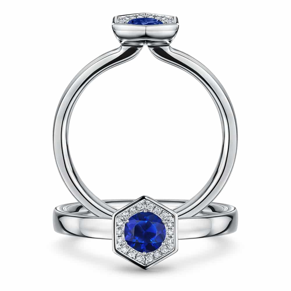 Chapiteau engagement ring with a sapphire centre and diamond halo