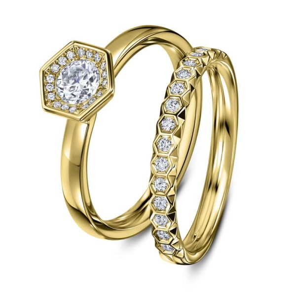 Chapiteau engagement ring in 18ct yellow gold shown with its matching diamond set wedding ring