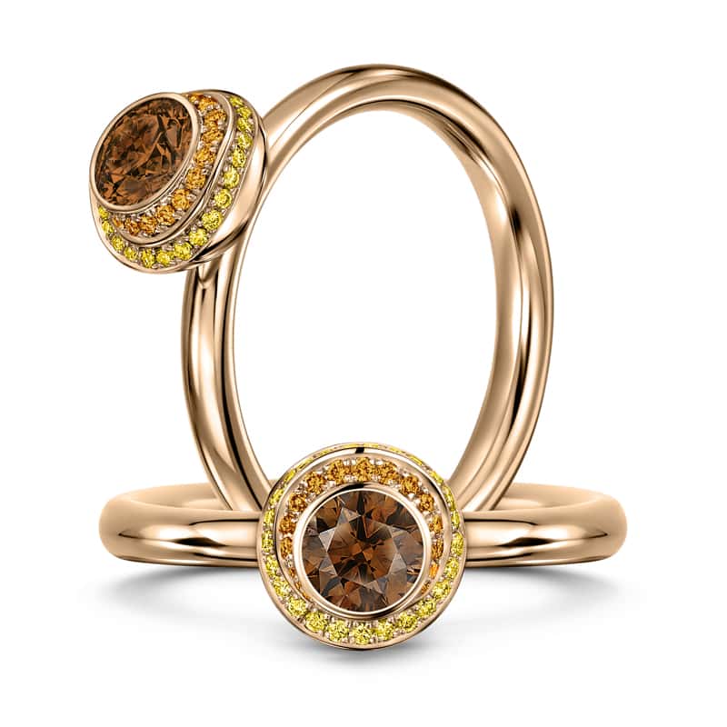 Clair de Lune Doré engagement ring with a chocolate diamond centre and warm coloured diamond halos