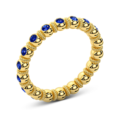 Sapphire gold ring with rhythmic stone setting