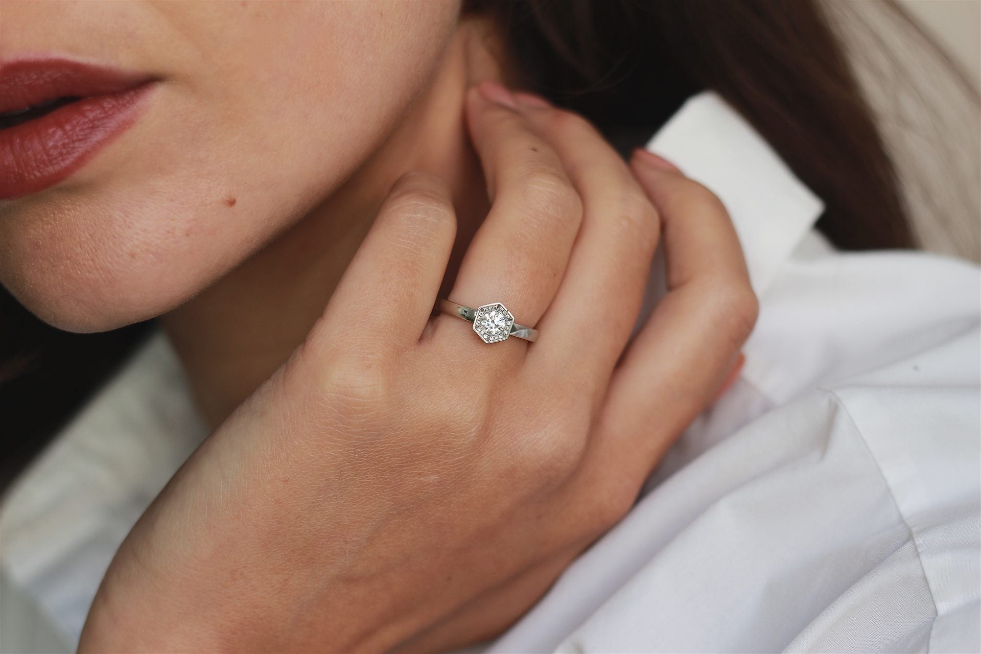 Hexagonal platinum engagement ring by Andrew Geoghegan, editorial portrait